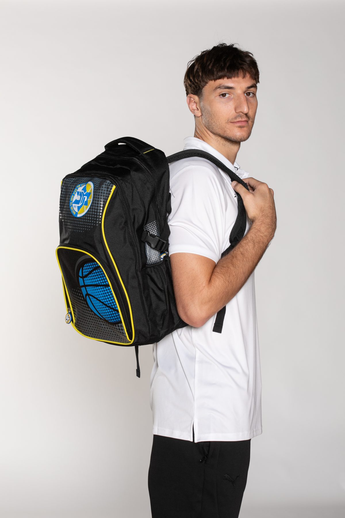 School backpack with a basketball compartment